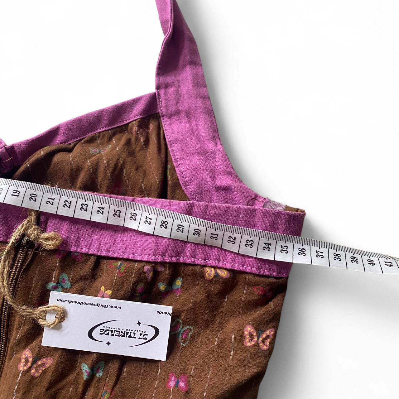 Y2K style brown halter dress with cute butterfly print