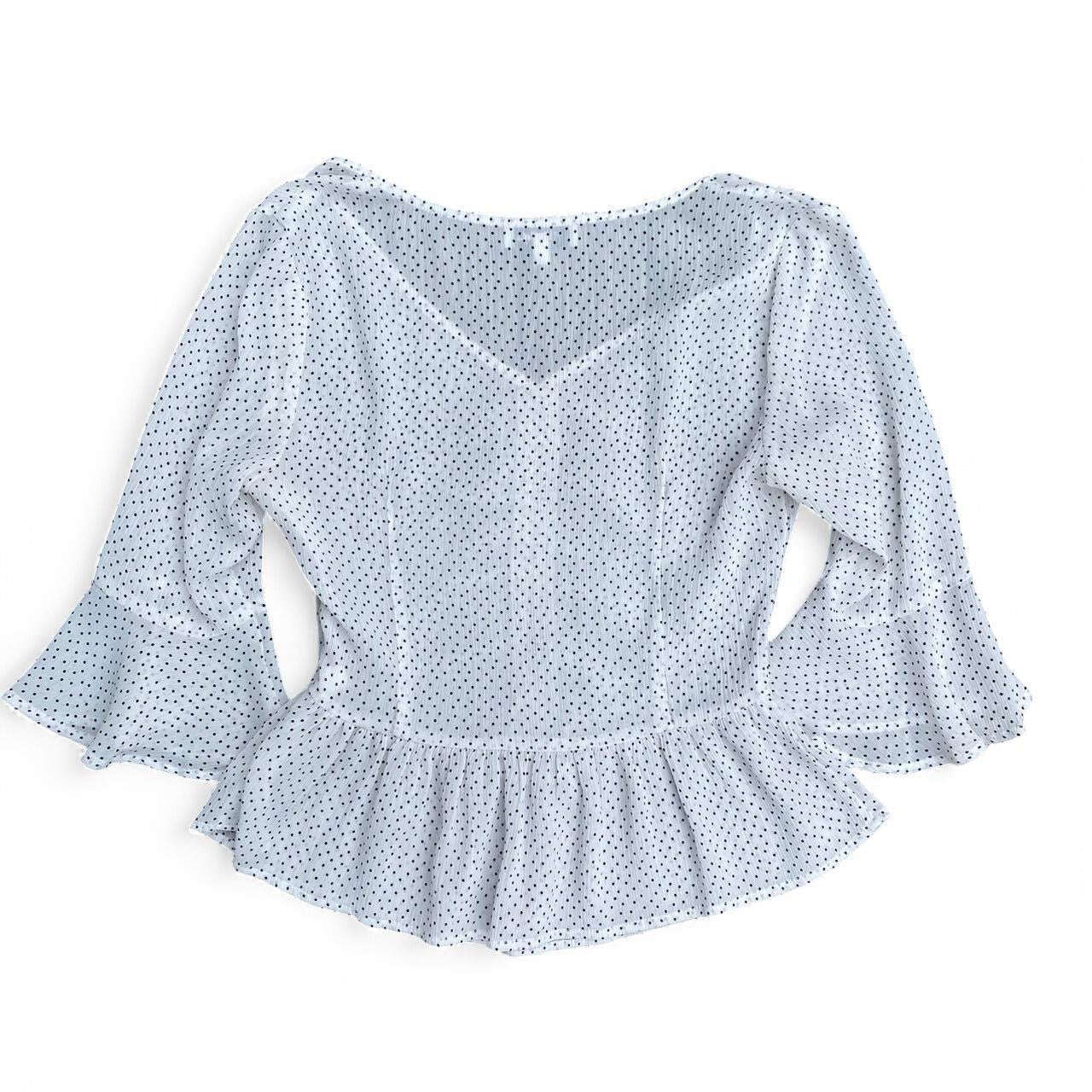 White polka dot peplum top with ruffles!