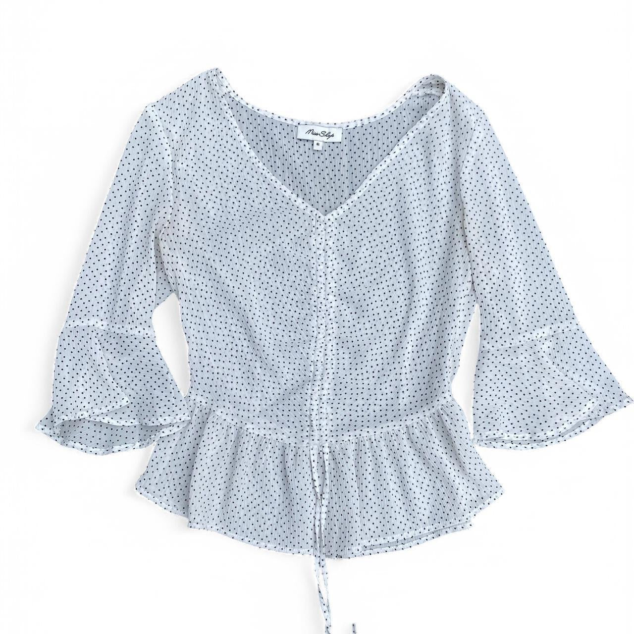 White polka dot peplum top with ruffles!