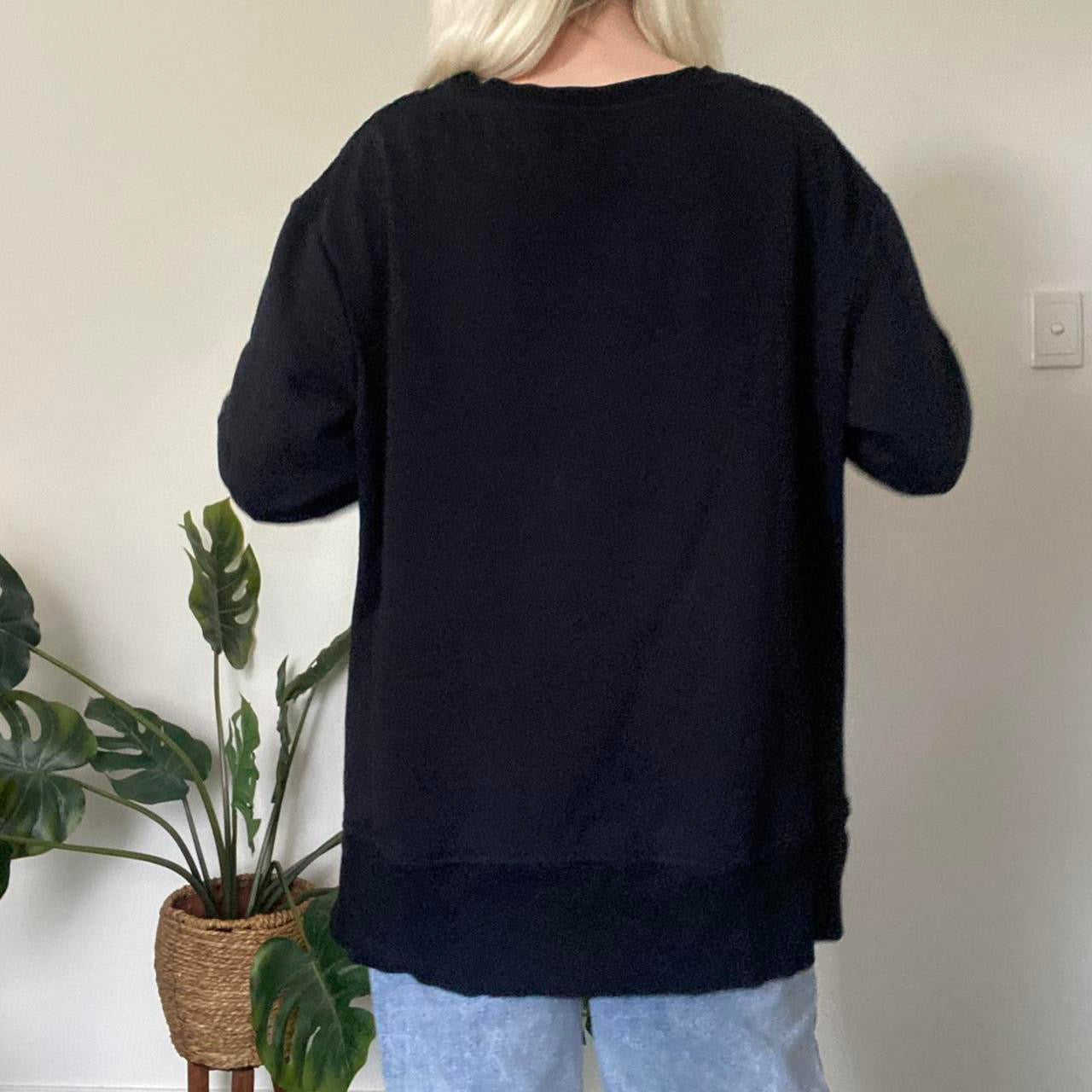 Black and grey leopard print oversized crew neck jumper