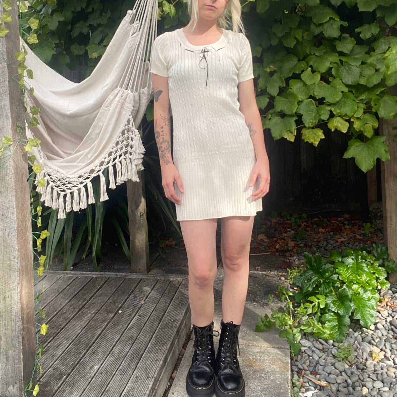 The cutest cream knit dress with black bow