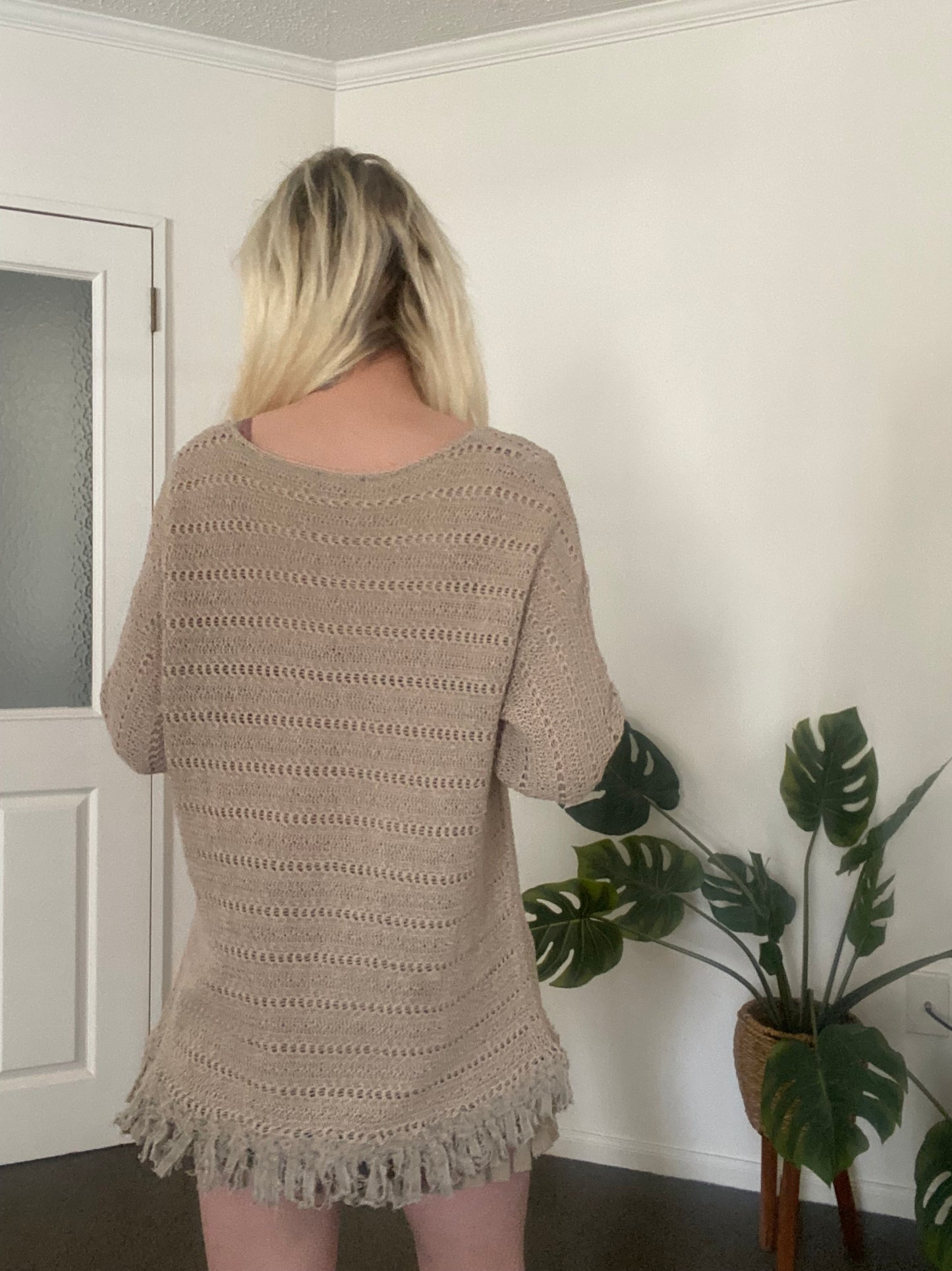 Fairy tan crochet sweater with fringe hem