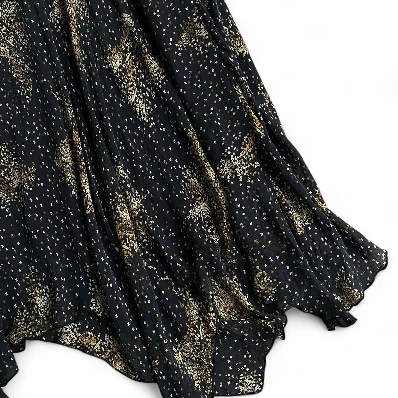 Y2K Black and gold star print asymmetrical midi dress