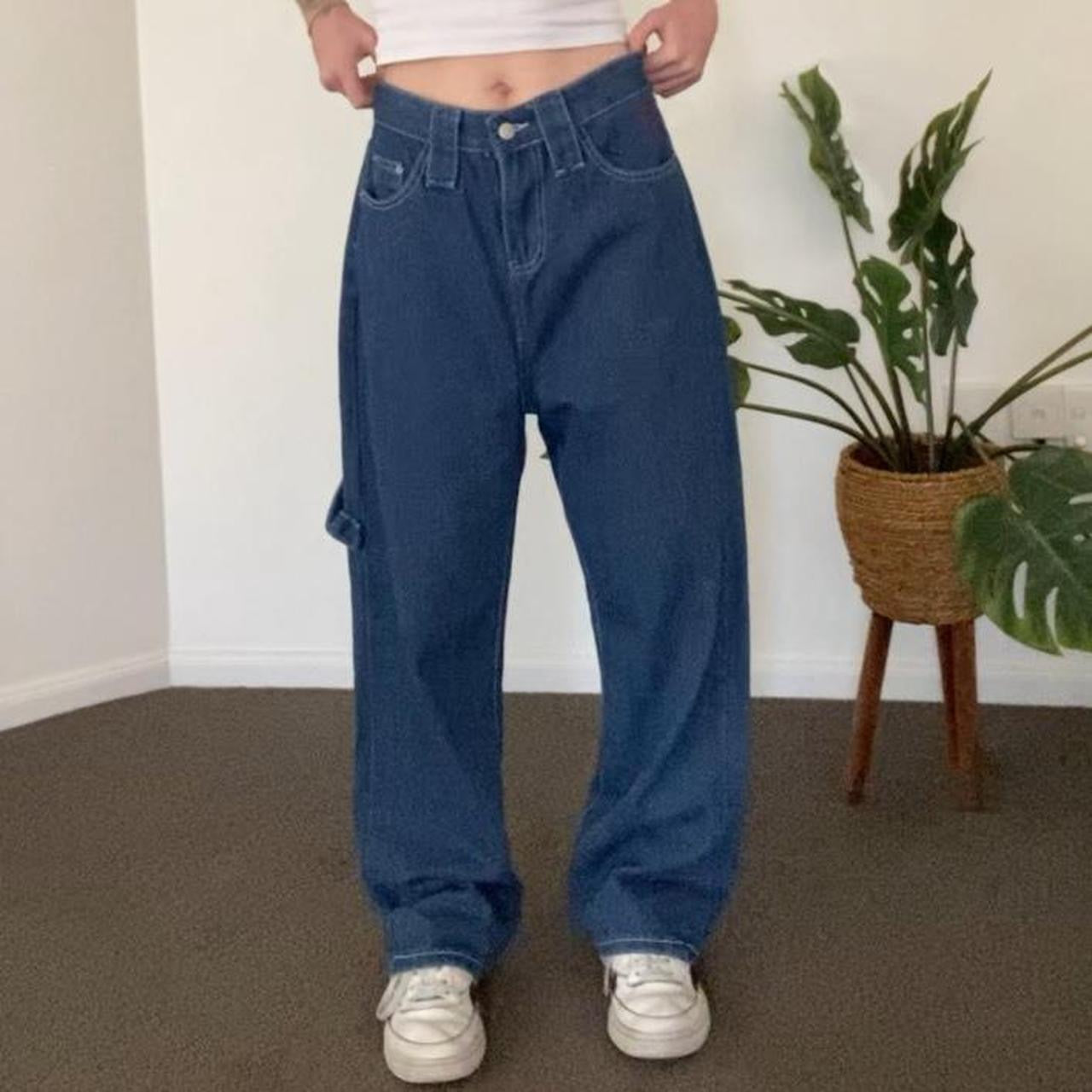 Denim blue jeans with red embroidery
