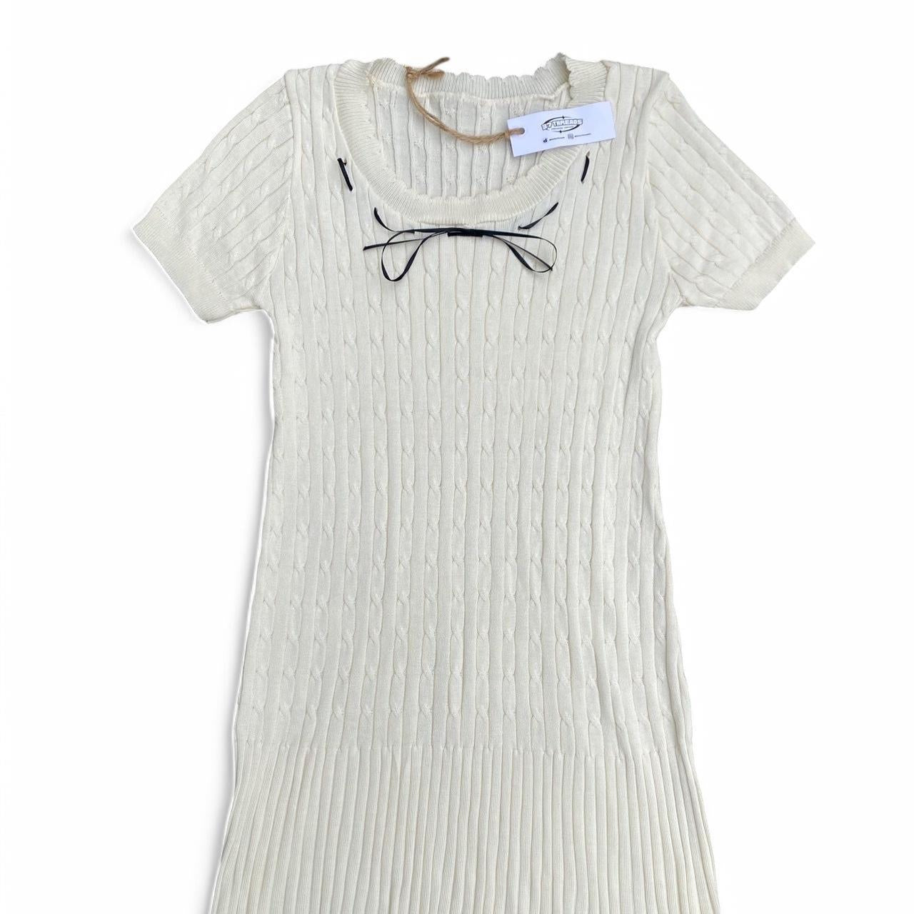 The cutest cream knit dress with black bow