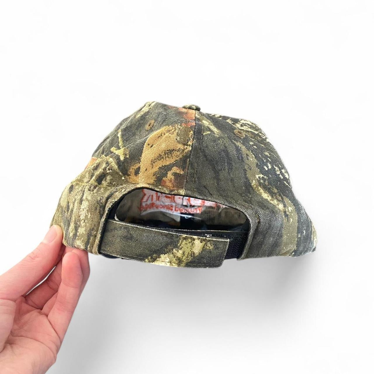 Sick real tree camo and orange cap!