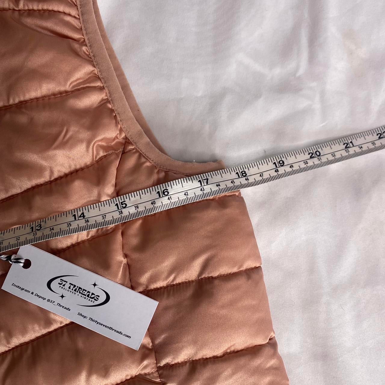 Blush pink puffer vest with hood