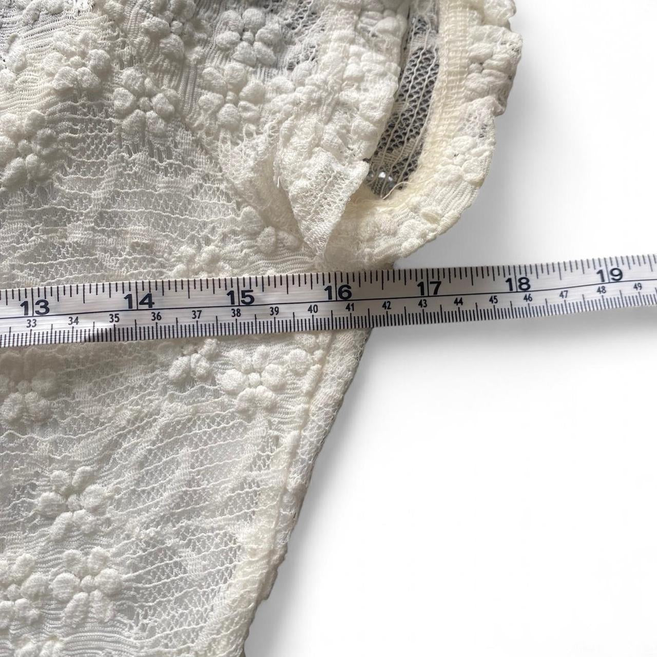 Cute Cream Motel lace top with ruffle details