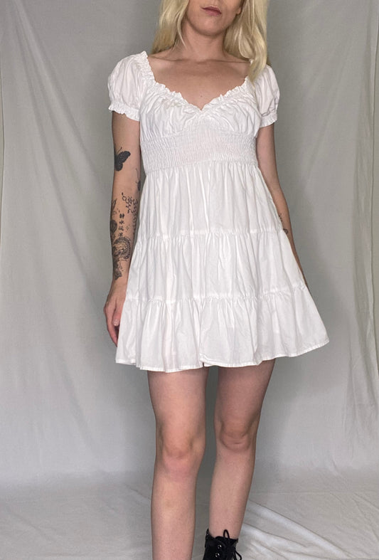 The cutest babydoll white peplum mini dress