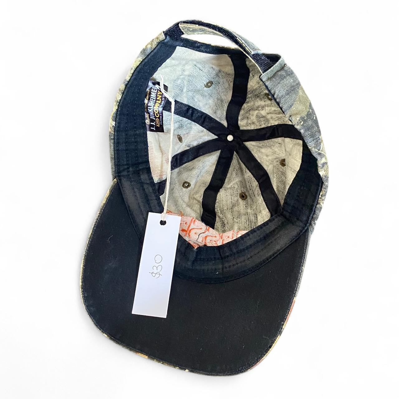 Sick real tree camo and orange cap!
