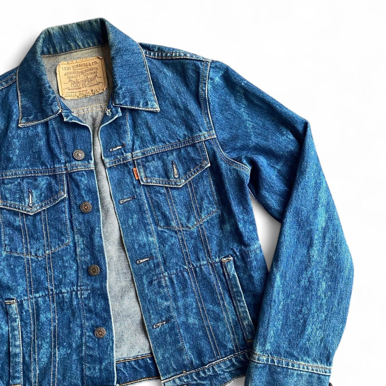 Vintage Levi's fitted blue denim jacket with acid wash finish