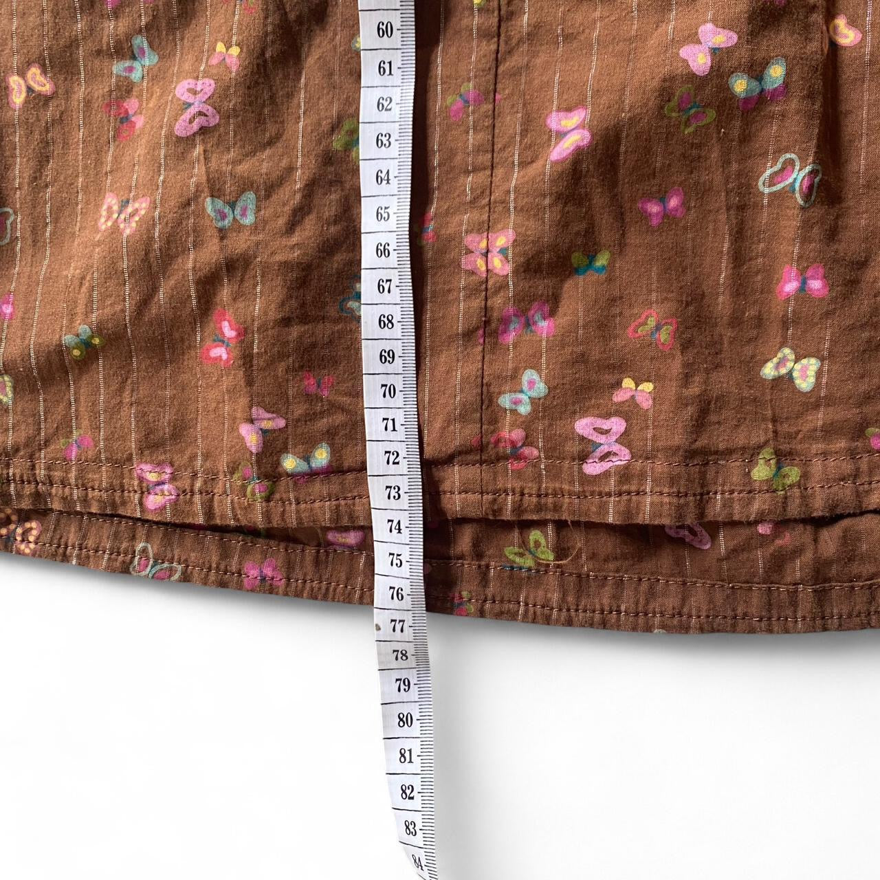 Y2K style brown halter dress with cute butterfly print