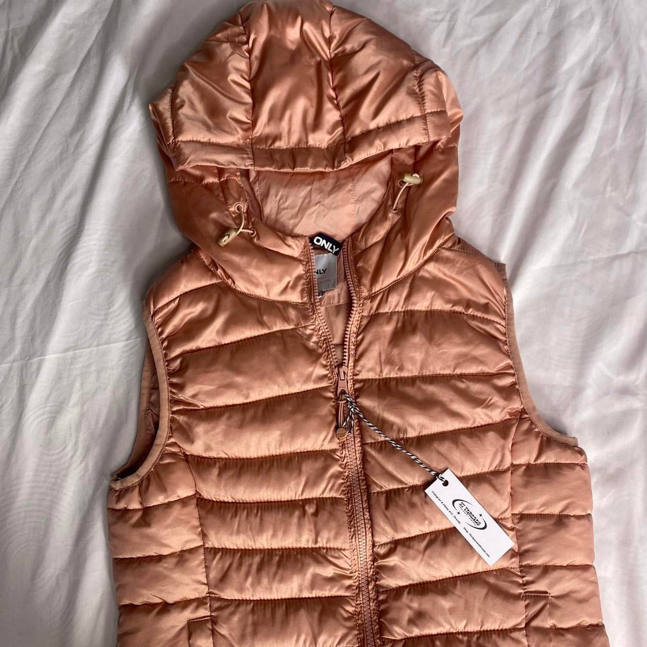 Blush pink puffer vest with hood