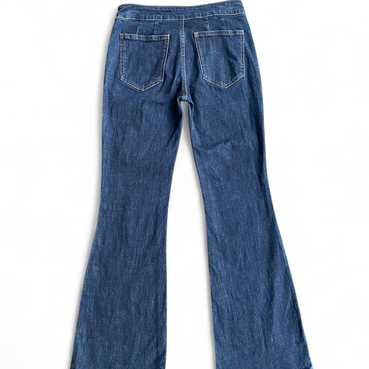 Low-rise flare jeans with button belt detail