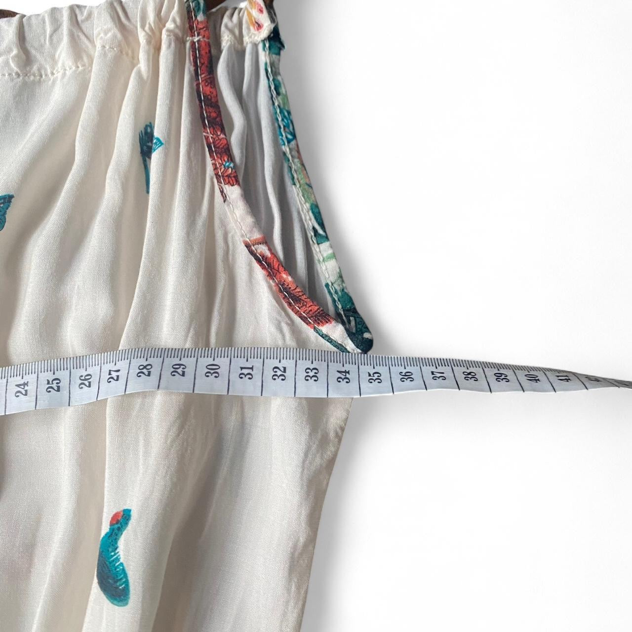 The cutest boho cream butterfly printed playsuit