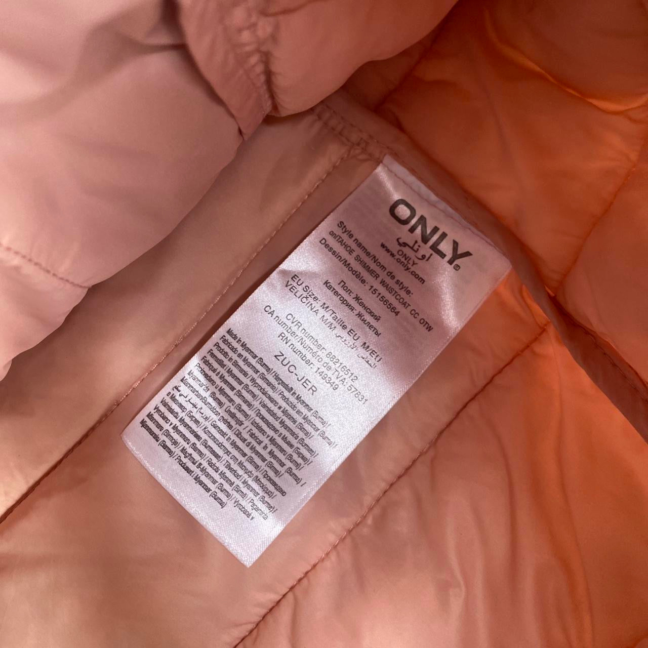 Blush pink puffer vest with hood