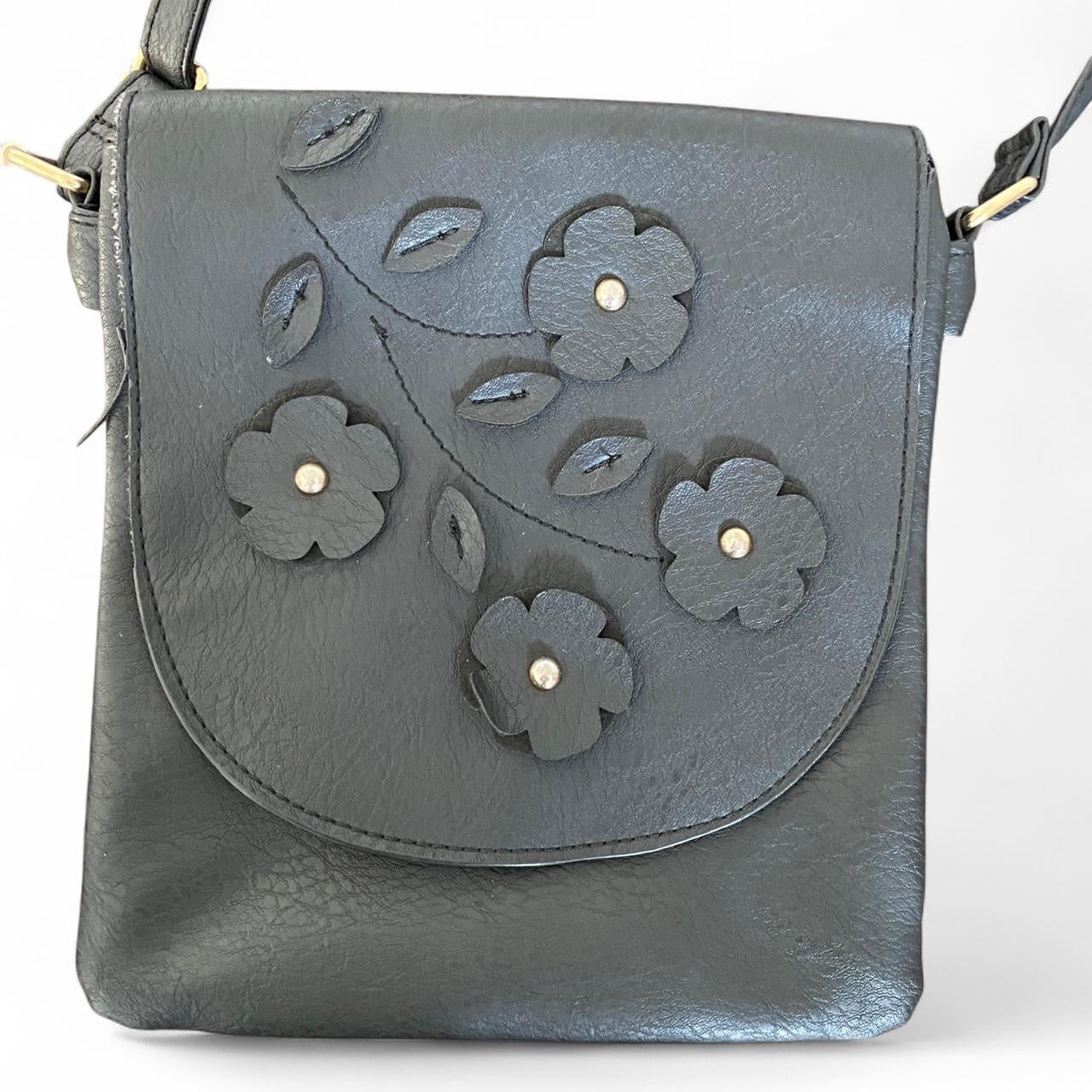 Black leather crossbody bag with cute floral design