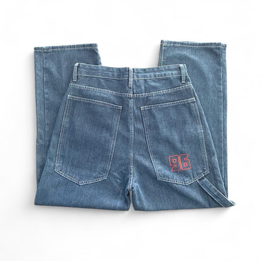 Denim blue jeans with red embroidery