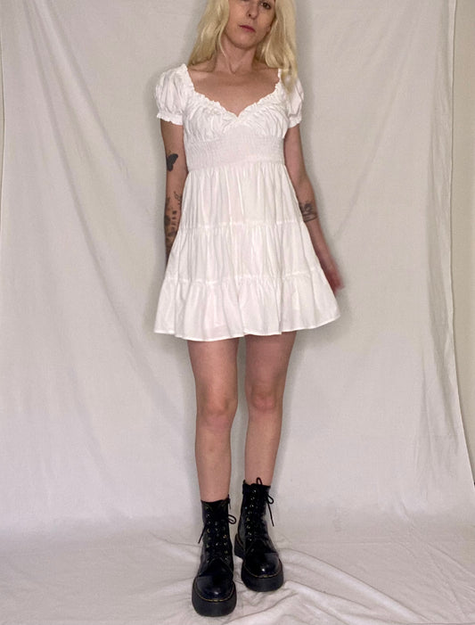 The cutest babydoll white peplum mini dress