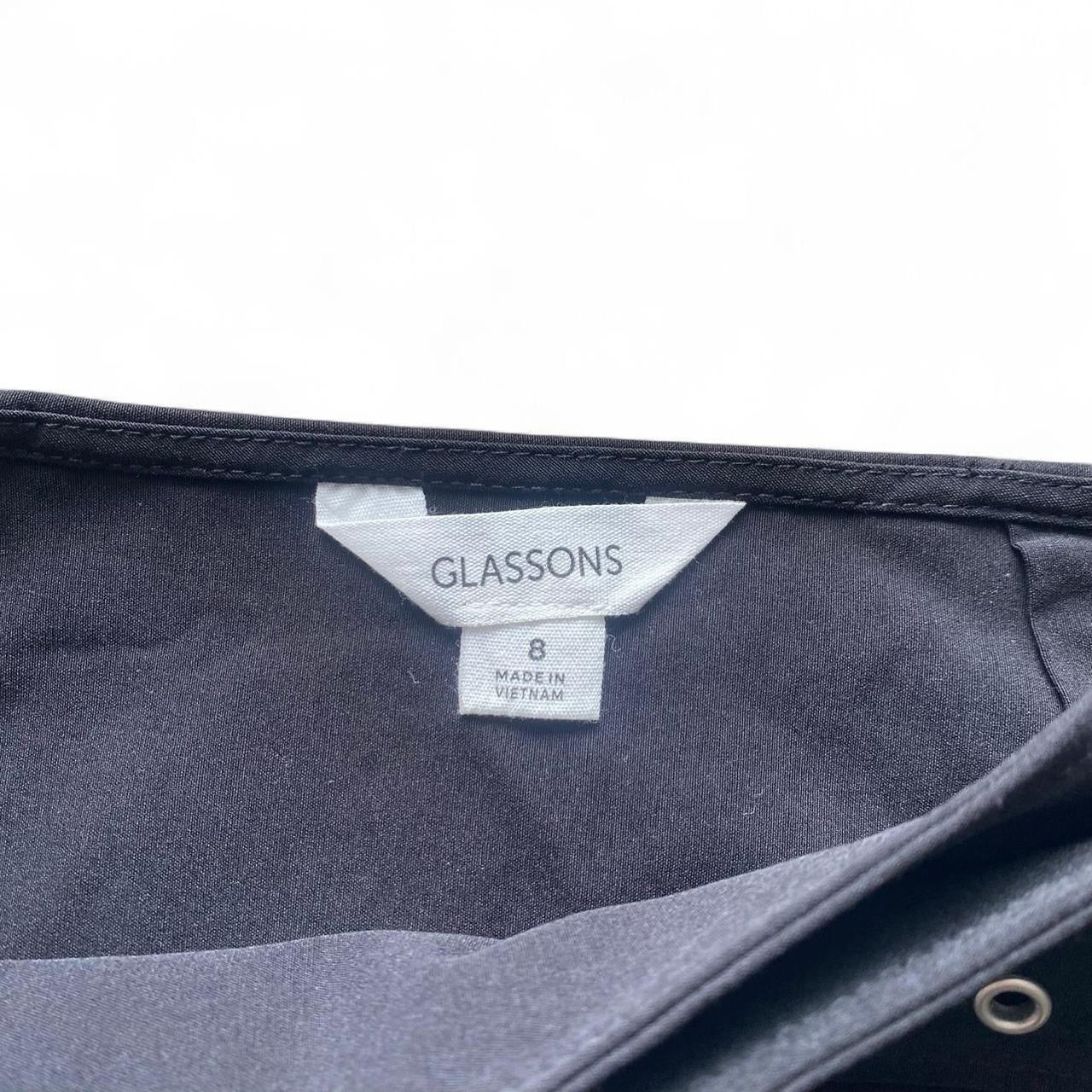 Black pleated mini skirt with built in belt