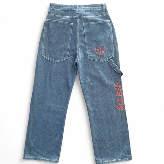 Denim blue jeans with red embroidery