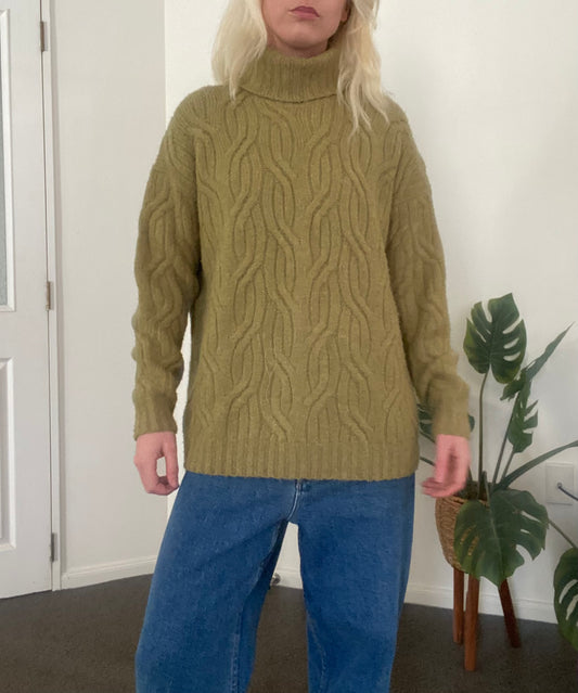 Beautiful olive green cable knit turtle neck sweater