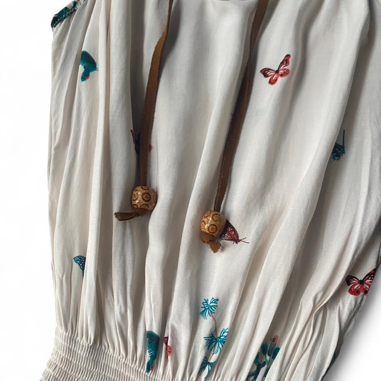 The cutest boho cream butterfly printed playsuit