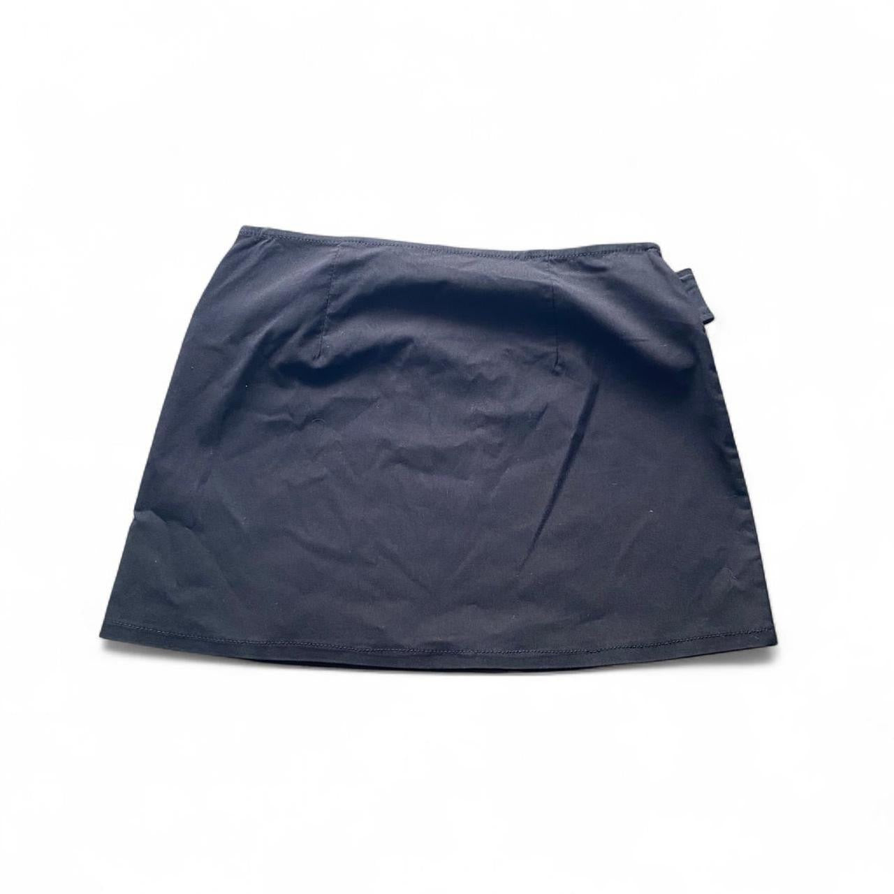 Black pleated mini skirt with built in belt