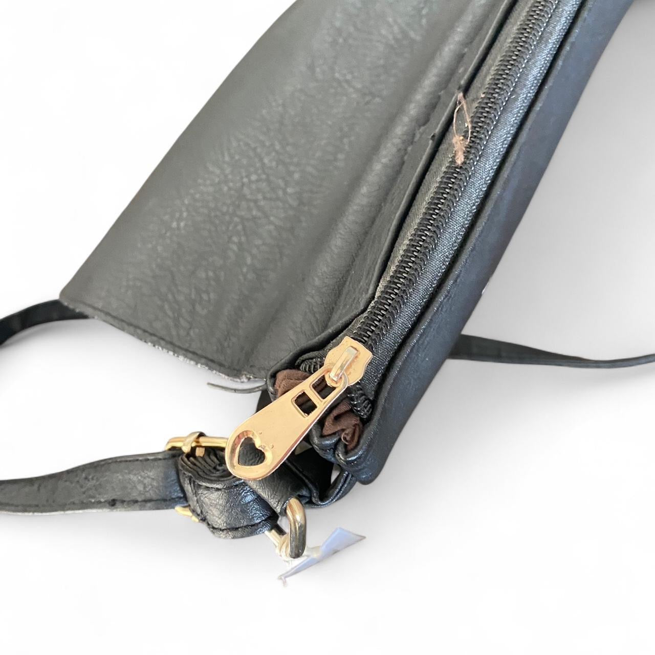 Black leather crossbody bag with cute floral design