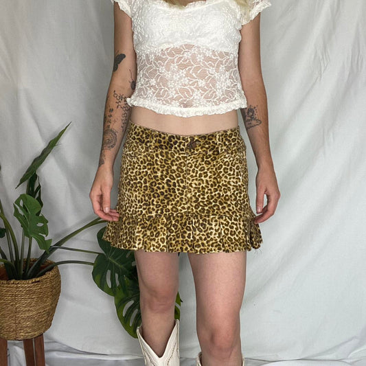 Re-worked cheetah print pleated mini skirt